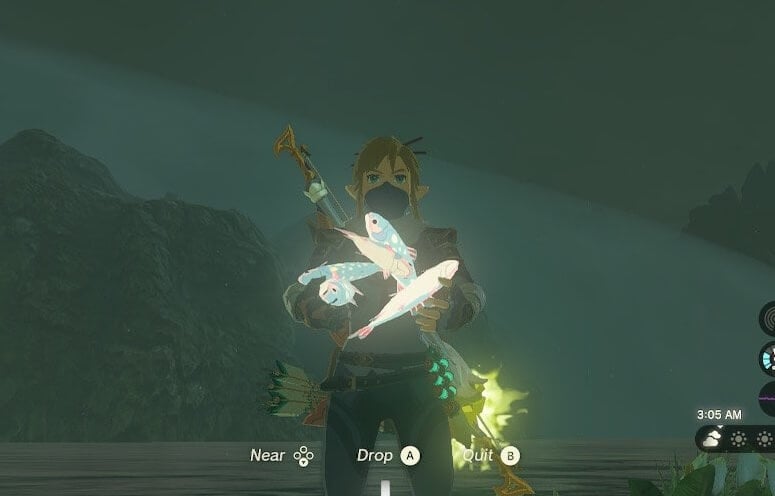 Link holding 5 Stealthfin Trout while wearing the Stealth outfit in Tears of the Kingdom